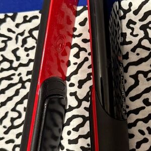 Remington Vibrant Red and Sleek Black pro glide flat iron.